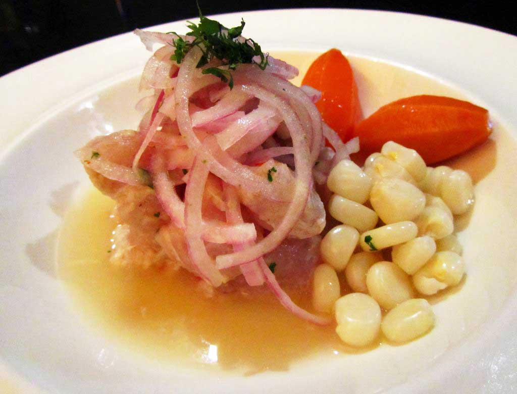 Ceviche Wallqa con camotes glaseados. Wallqa Ceviche with glazed sweet potatoes. Image by placeOK